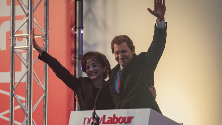 Tony and Cherie Blair waving