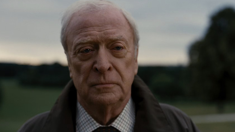 Alfred at Bruce's funeral