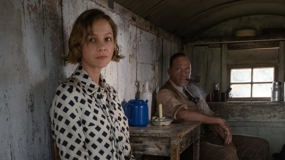 Edith and Basil in a shed