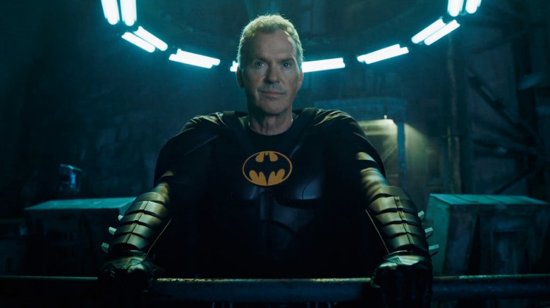 Batman proudly smirking in his Batcave