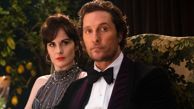 Michelle Dockery and Matthew McConaughey sitting on couch