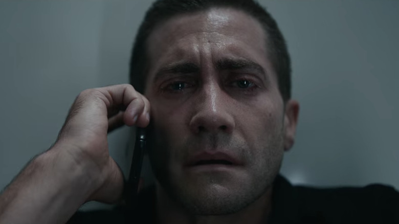 Jake Gyllenhaal crying on the phone in The Guilty