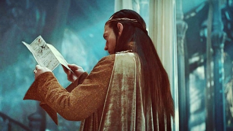 Elrond reads a map