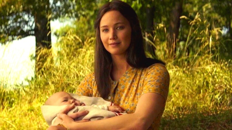 Katniss holding her baby