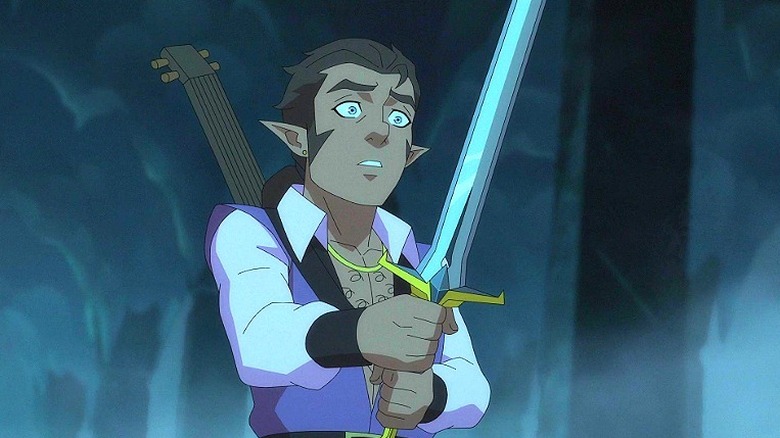 Scanlan holding a sword