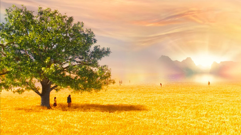 Golden field with girls under tree in "The Lovely Bones"