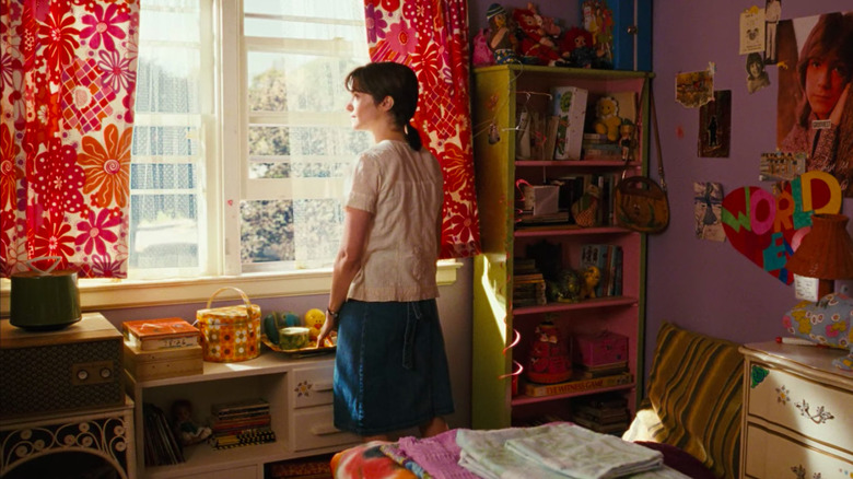 Rachel Weisz as Abigail Salmon looking out window in "The Lovely Bones"