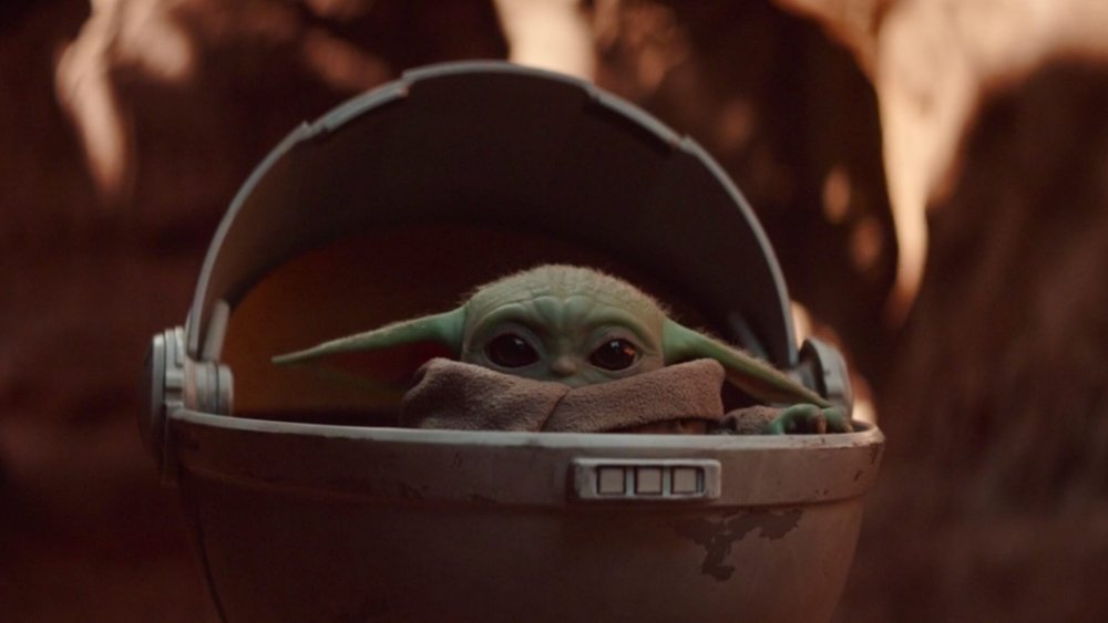 Baby Yoda's cuteness melts the Beskar steel that is The Mandalorian's heart