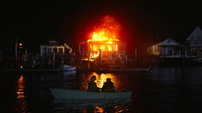 Susie and her sister watch their mother's house burn down