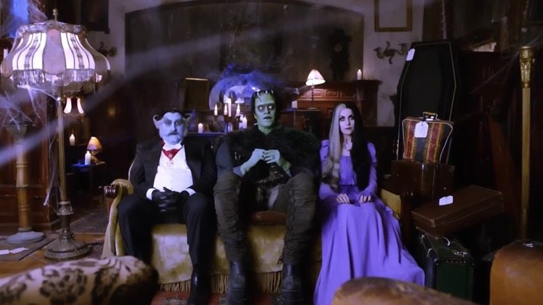 The Count, Herman, and LIly sit in their living room, looking nervous