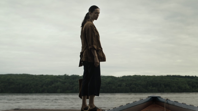 Beth standing on the dock