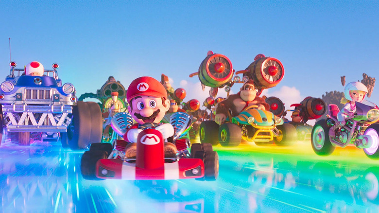 Mario and his friends racing on Rainbow Road