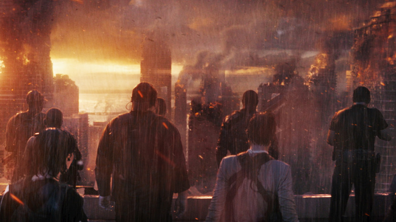 Soldiers looking out at ruined city