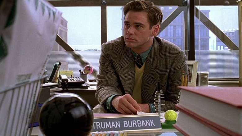 Truman sitting at desk