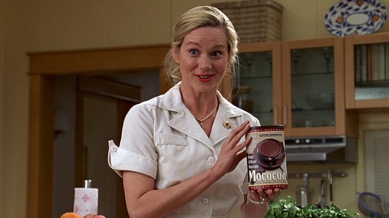 Meryl holding Mococoa as product placement