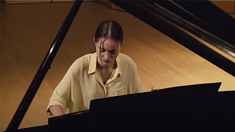 Katie playing piano The Unforgivable