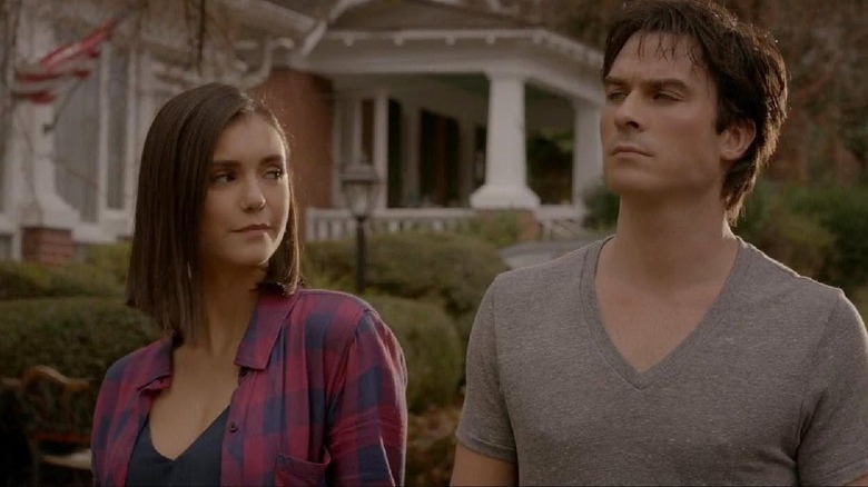 Damon and Elena walk together