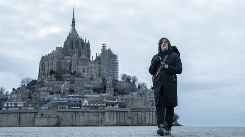 Daryl Dixon beside Mont-Saint-Michel