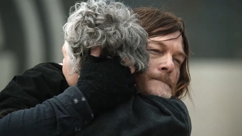 Carol and Daryl hug