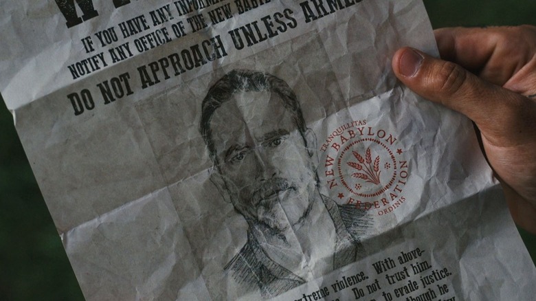 Negan holding wanted poster