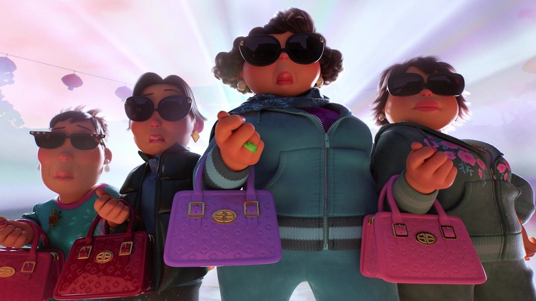 Mei's aunties pose with handbags