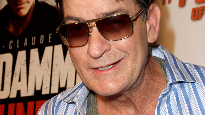 Charlie Sheen smiling at film premiere