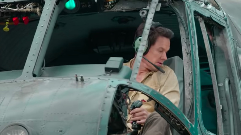 Sully looking out of the helicopter Uncharted