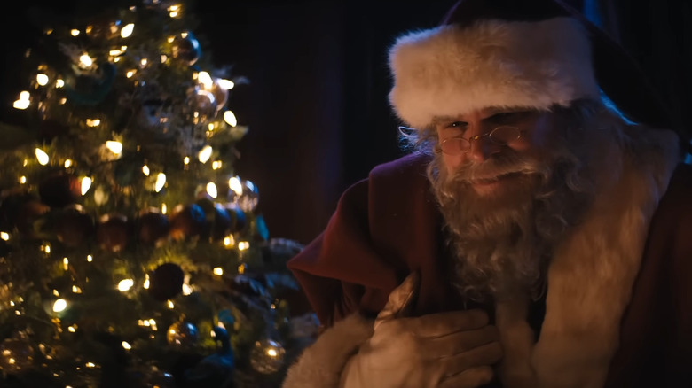 David Harbour as Santa smiling