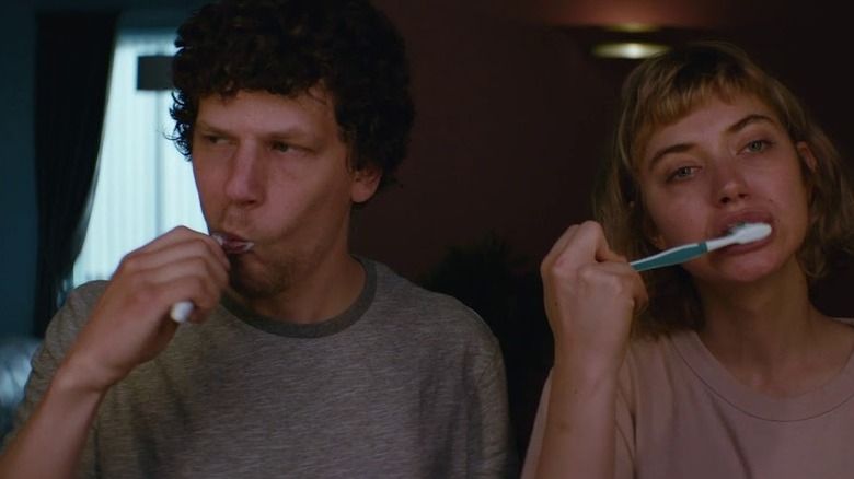 Tom and Gemma brush their teeth