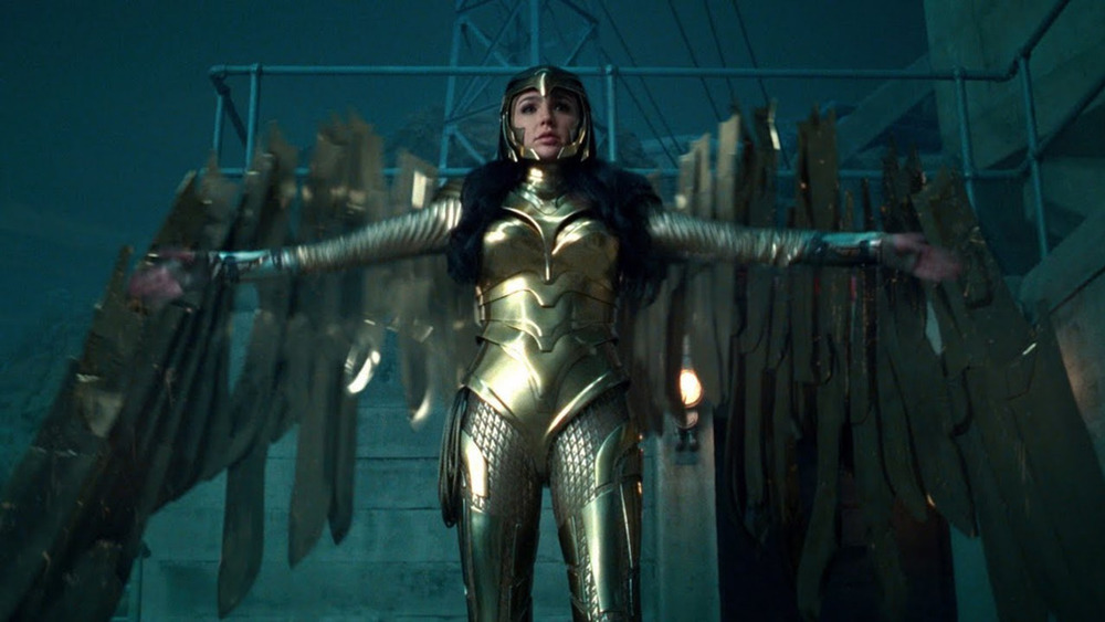 Wonder Woman striding into battle in her gold armor