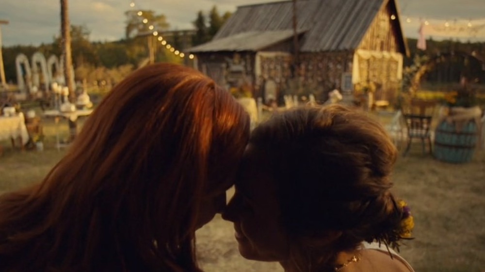 Waverly and Nicole share a blissful, post-wedding reflection on the Homestead porch