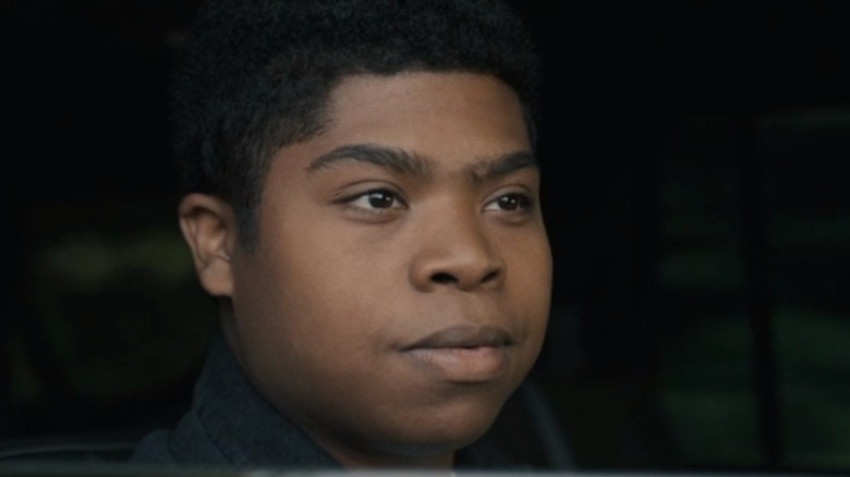 Benjamin Flores Jr. looks into distance