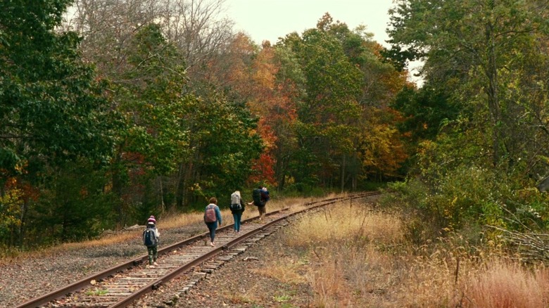 Abbotts walking on train tracks