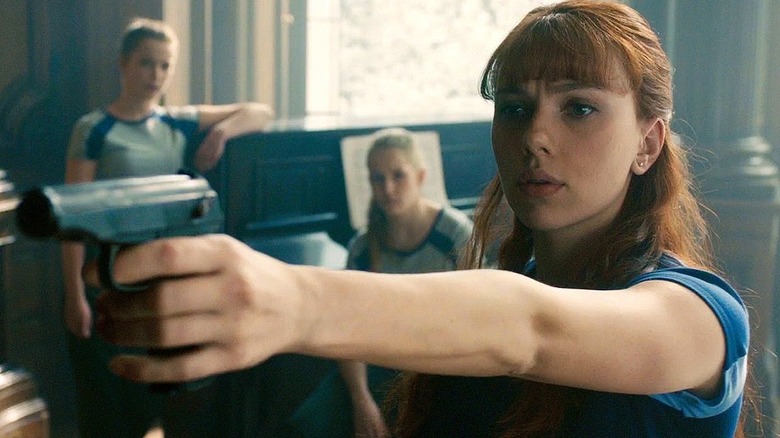 Romanoff fires a gun