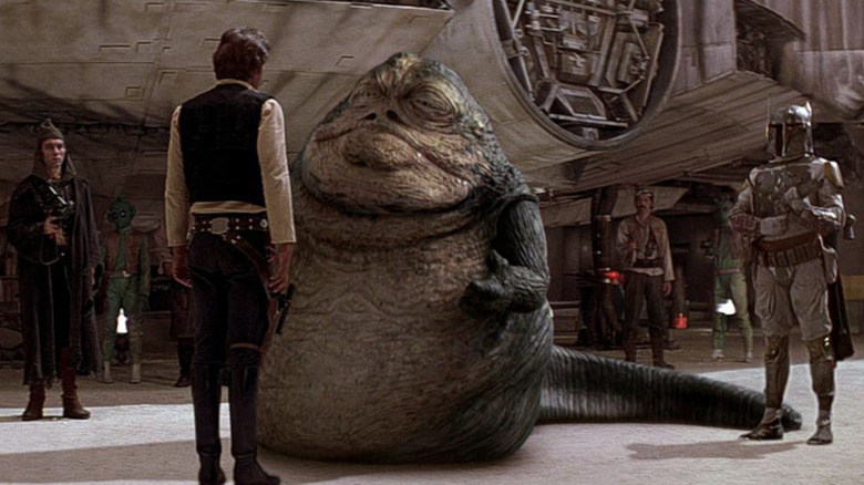 Boba and Jabba confront Han Solo