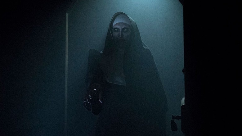 The Nun in a doorway