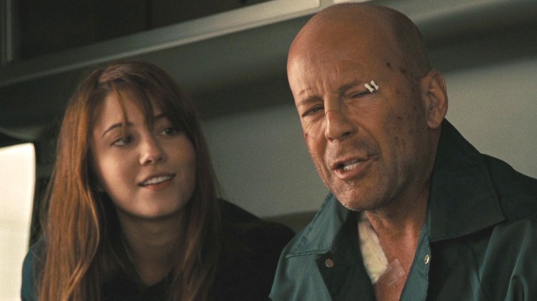 Lucy and John McClane in ambulance