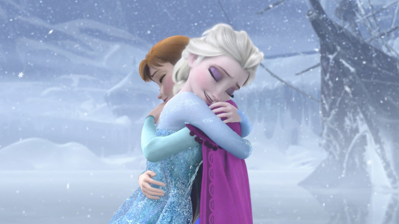 Elsa and Anna hug in Frozen