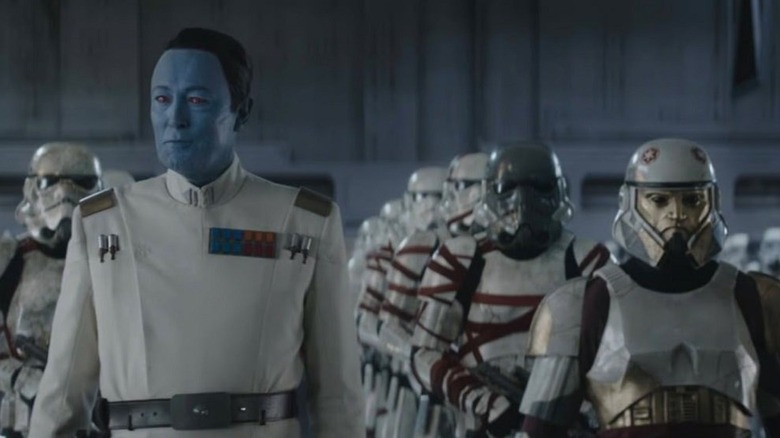 Enoch stands at Thrawn's side