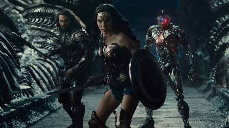 Wonder Woman, Cyborg, and Aquaman preparing to fight