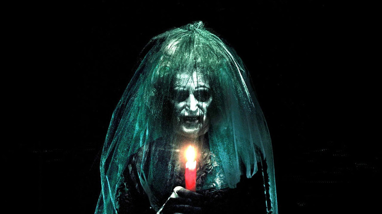 Bride in Black with candle