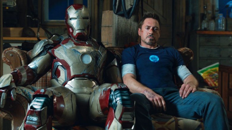 Iron Man on the couch with his armor