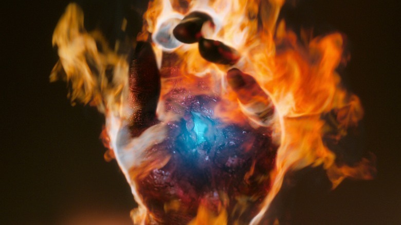 Angelina Meyer's hand in lava