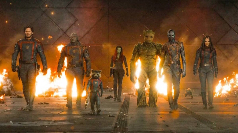 Guardians of the Galaxy walking with flames behind them