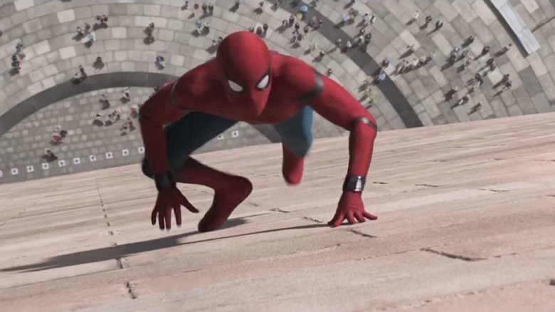 Spider-Man climbing a wall