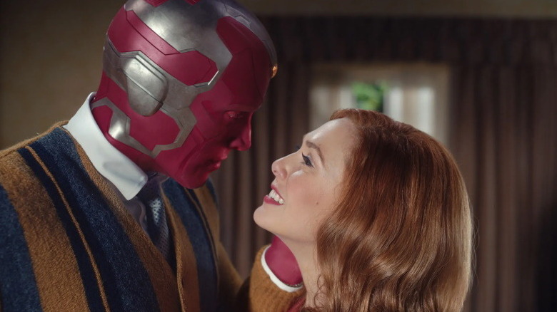 Wanda and Vision embracing