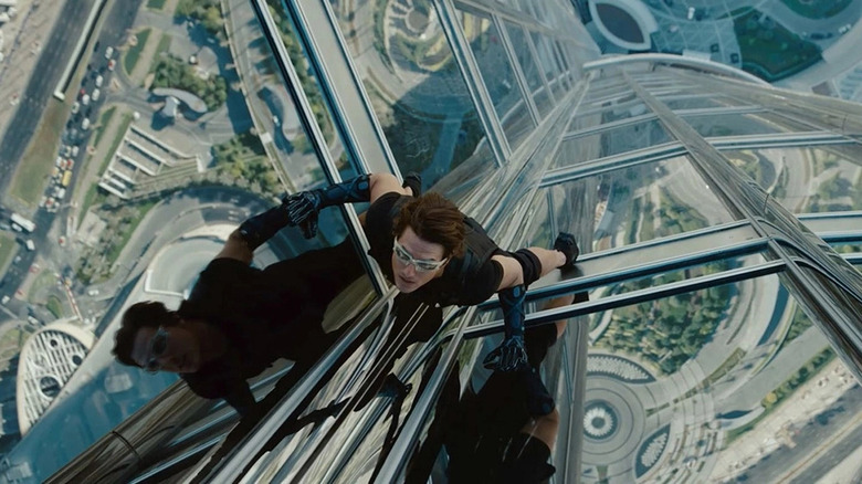 Ethan climbs glass building