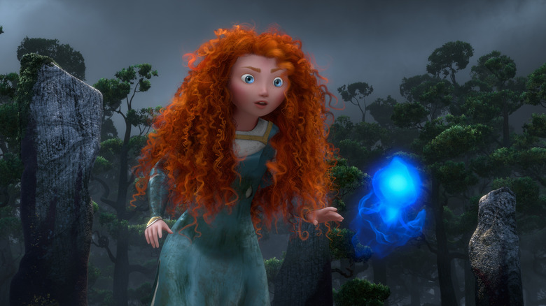 Merida standing on front of magical whisp Brave