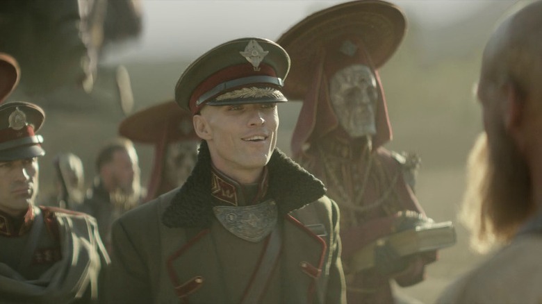 Admiral Noble smirking at Sindri