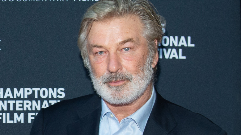 Alec Baldwin with beard and suit
